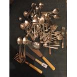 A LARGE QUANTITY OF FLATWARE INCLUDING SERVERS