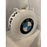 A WHITE BMW PETROL CAN WITH A BRASS TOP