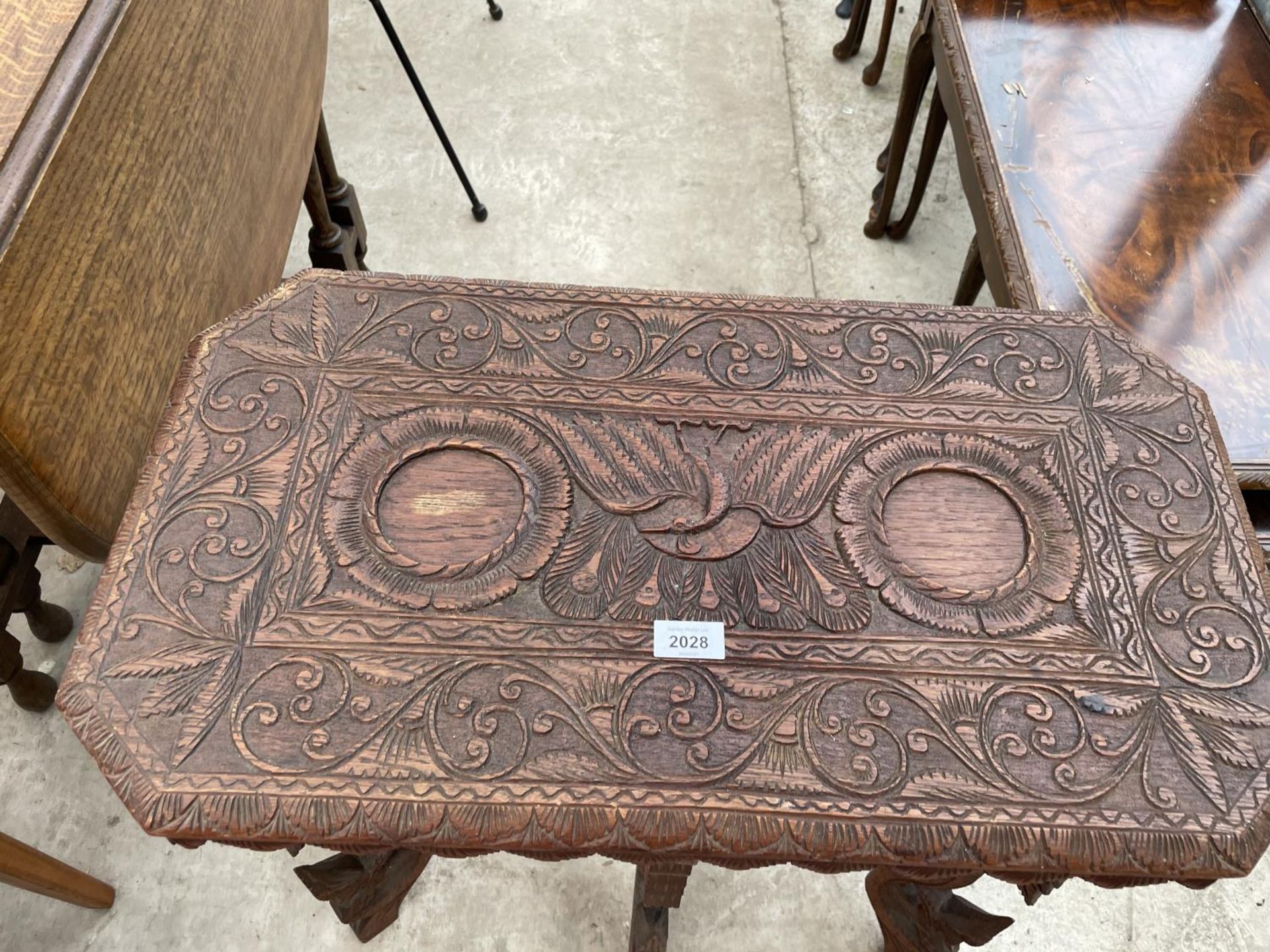 A HEAVILY CARVED ASIAN HARDWOOD TWO TIER OCCASIONAL TABLE, 26X14" - Image 2 of 6