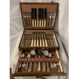 A FORTY EIGHT PIECE CANTEEN OF CUTLERY IN AN OAK PRESENTATION CASE