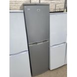 A SILVER ZANUSSI UPRIGHT FRIDGE FREEZER BELIEVED IN WORKING ORDER BUT NO WARRANTY