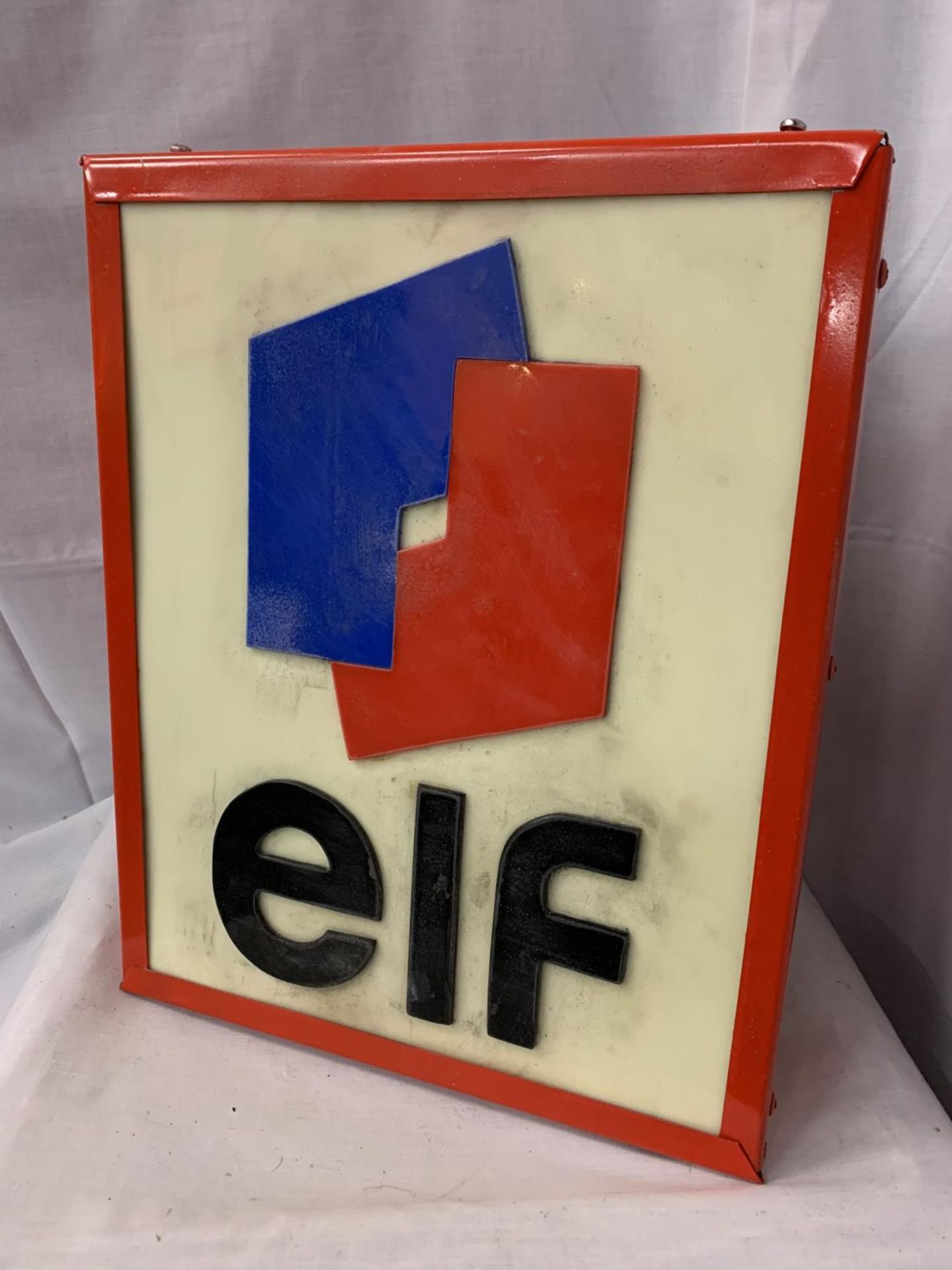 AN ILLUMINATED 'ELF' SIGN