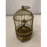 A BIRD CAGE MYSTERY CLOCK