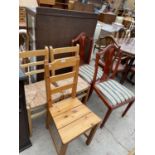 A PAIR OF RUSH SEATED DINING CHAIRS AND SIMILAR CHAIR WITH SOLID SEAT, ALSO A PAIR OF REGENCY