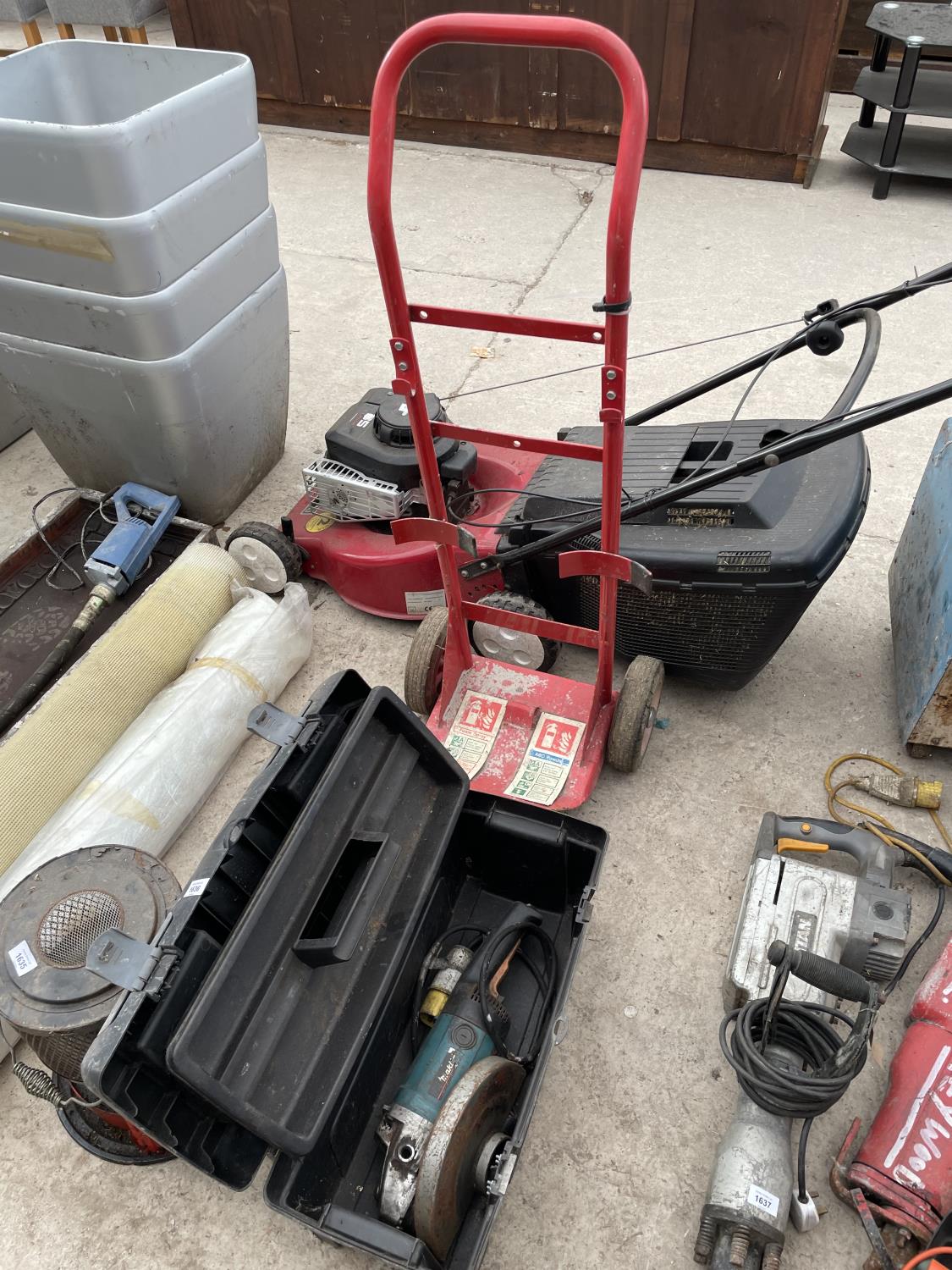 A MAKITA GRINDER AND A TROLLEY