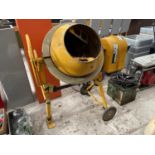 A CLARKE ROLL OVER CEMENT MIXER BELIEVED IN WORKING ORDER BUT NO WARRANTY