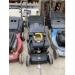 A MCCULLOCH PETROL LAWN MOWER WITH GRASS BOX BELIEVED WORKING ORDER BUT NO WARRANTY