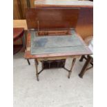 AN EDWARDIAN MAHOGANY AND INLAID FOLD OVER WRITING TABLE STAMPED J.A.S. SHOOLBRED & CO, 27" WIDE