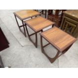 A RETRO TEAK NEST OF THREE G-PLAN TABLES