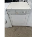 A WHITE MIELE NOVOTRONIC T490 TUMBLE DRYER BELIEVED IN WORKING ORDER BUT NO WARRANTY