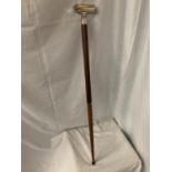 A WALKING STICK WITH A TELESCOPE HANDLE