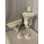 A PAIR OF CERAMIC WALL MOUNTED WATER VESSELS AND BOWL WITH DECORATIVE BLUE AND WHITE FLOWERS IN