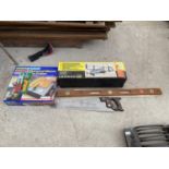 AN ASSORTMENT OF ITEMS TO INCLUDE A TEAK SPIRIT LEVEL, A DISSTON SAW AND A DIAMOND WHEEL TILE CUTTER
