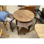 A CIRCULAR MAHOGANY NEST OF FOUR TABLES, 24" DIAMETER