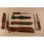 A COLLECTION OF 5 SURVIVAL KNIVES TO INCLUDE A MILITARY EXAMPLE DATED 1993, BLADE LENGTHS FROM
