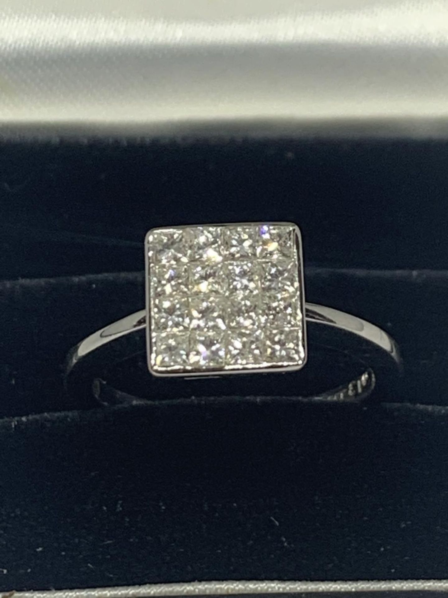 AN 18 CARAT WHITE GOLD RING WITH SIXTEEN DIAMONDS SET IN A SQUARE GROSS WIEGHT 3.9 GRAMS SIZE L/M - Bild 2 aus 5