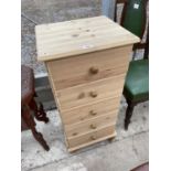 A MODERN PINE FIVE DRAWER CHEST OF DRAWERS