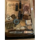 A COLLECTION OF ASSORTED MILITARIA AND COINAGE TO INCLUDE RATION BOOK, DEACTIVATED BULLETS ETC.