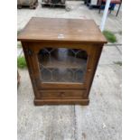 AN OLD CHARM STYLE STEREO CABINET