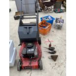 A SELF PROPELLED CHAMPION PETROL LAWN MOWER WITH GRASS BOX