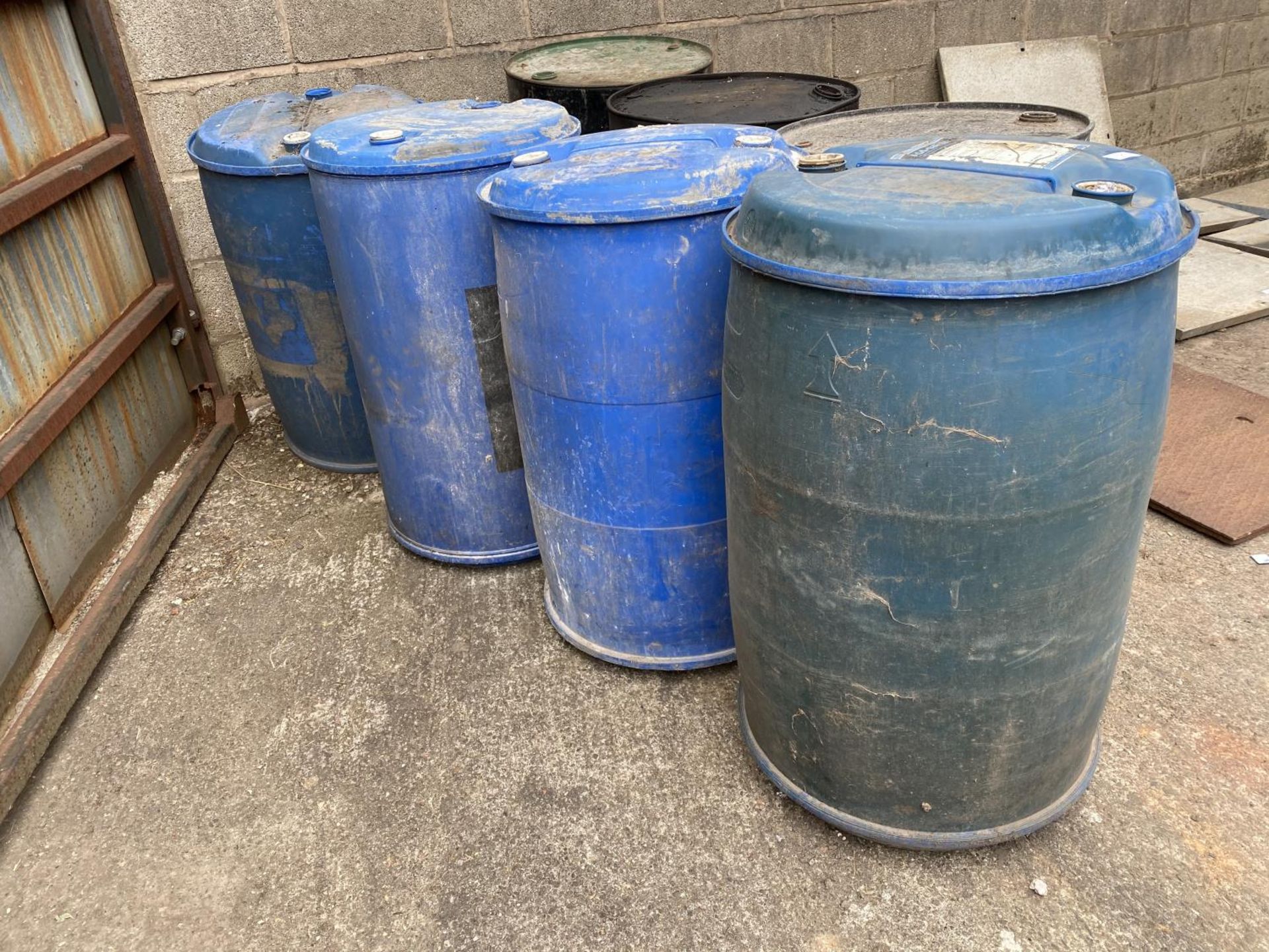 4 BLUE PLASTIC DRUMS