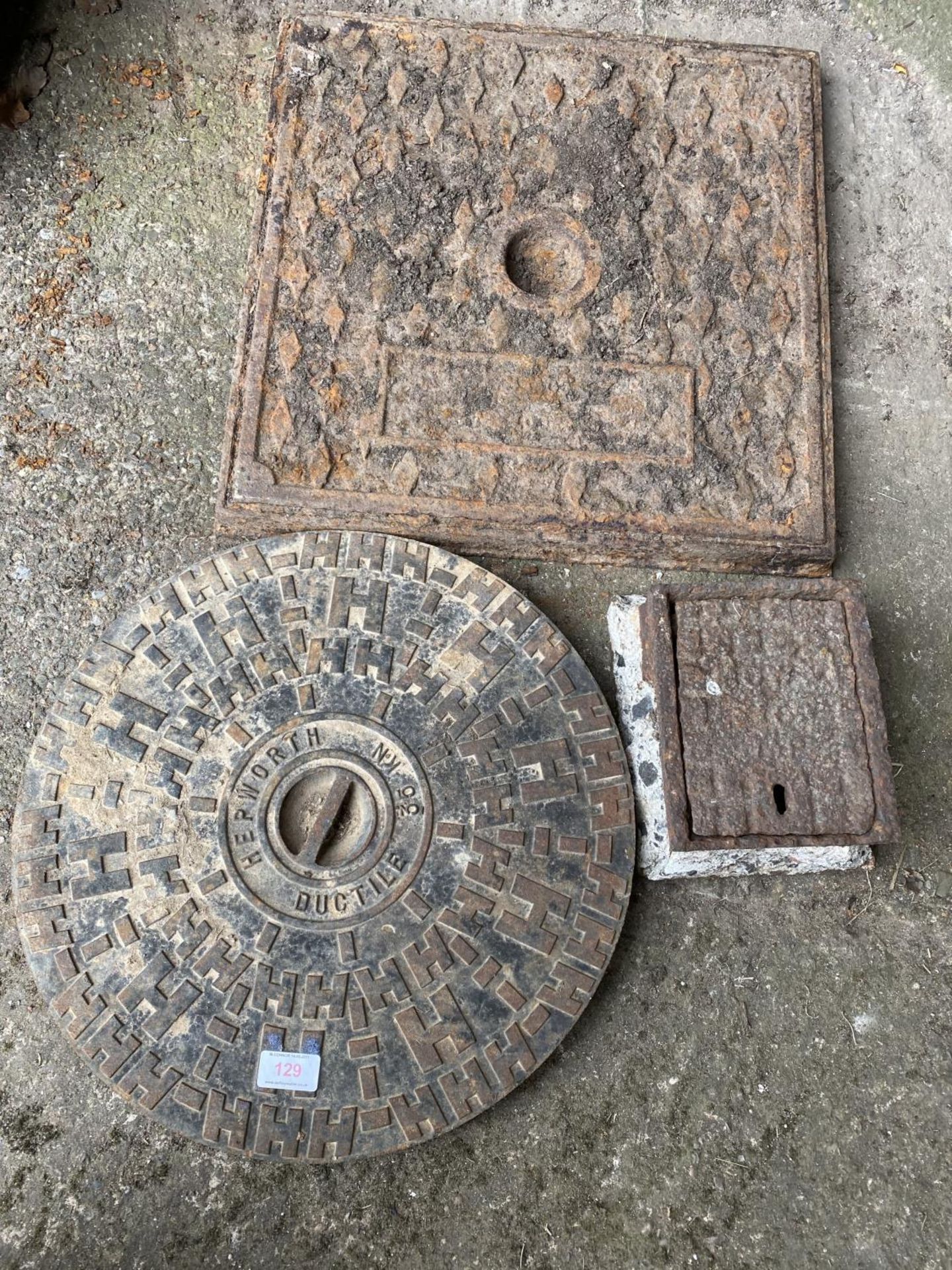 3 MANHOLE COVERS