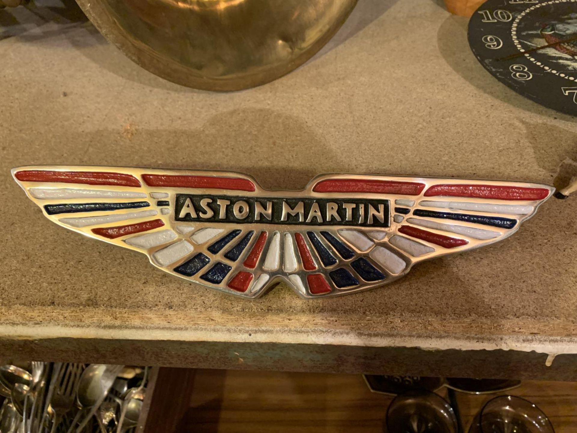 A CHROME ASTON MARTIN UNION JACK WALL PLAQUE