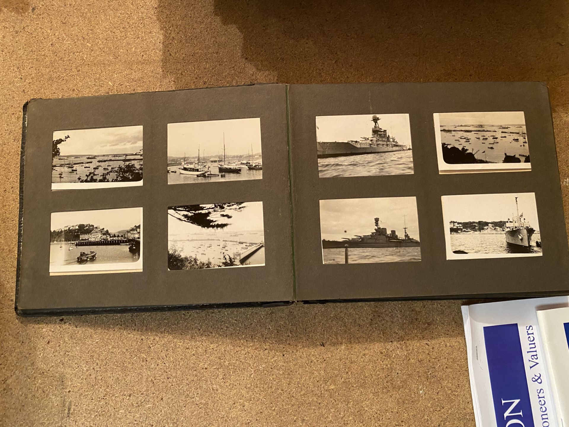 A SMALL VINTAGE PHOTO ALBUM CONTAINING BLACK AND WHITE IMAGES - Image 3 of 8