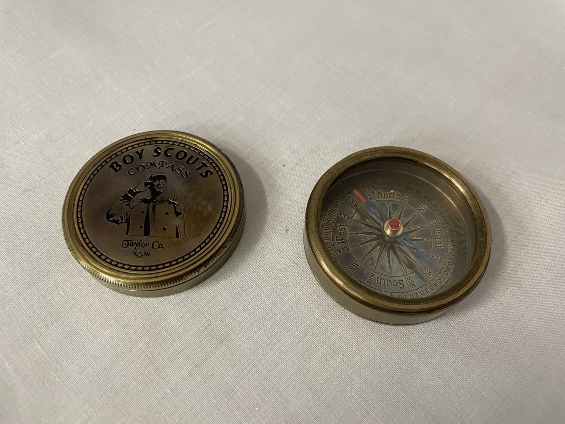 A BRASS BOY SCOUTS COMPASS