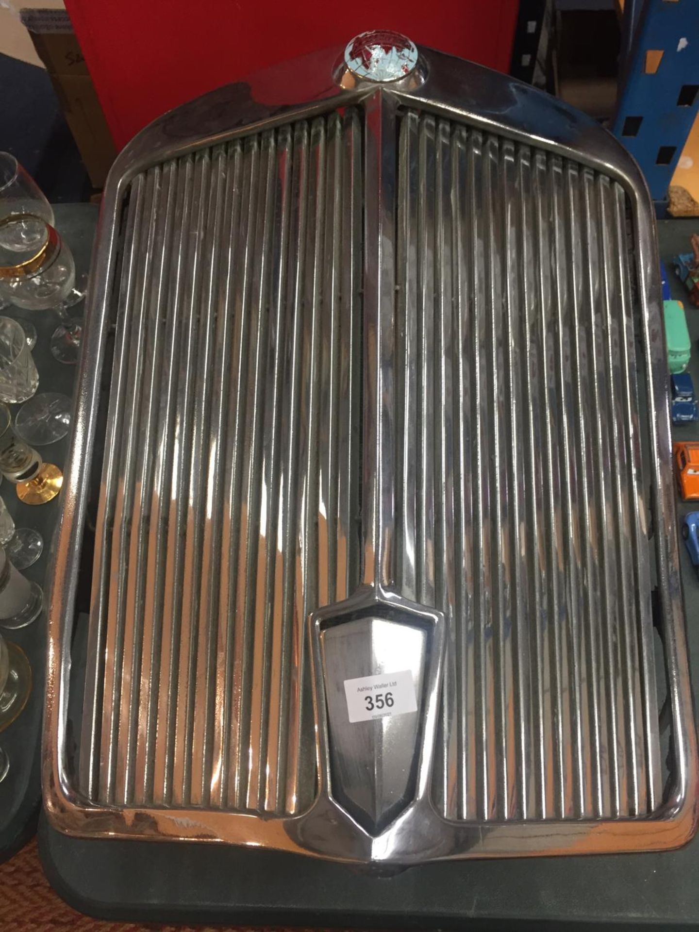 A VINTAGE TRIUMPH ROADSTER APPROXIMATELY 1949 RADIATOR AND GRILL