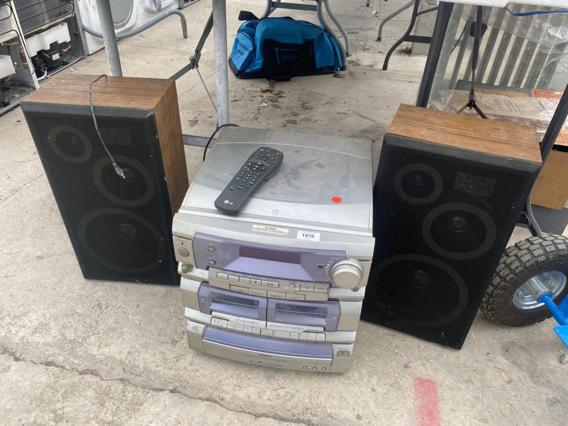 A GOODMANS HI-FI AND A PAIR OF WOODEN SPEAKERS