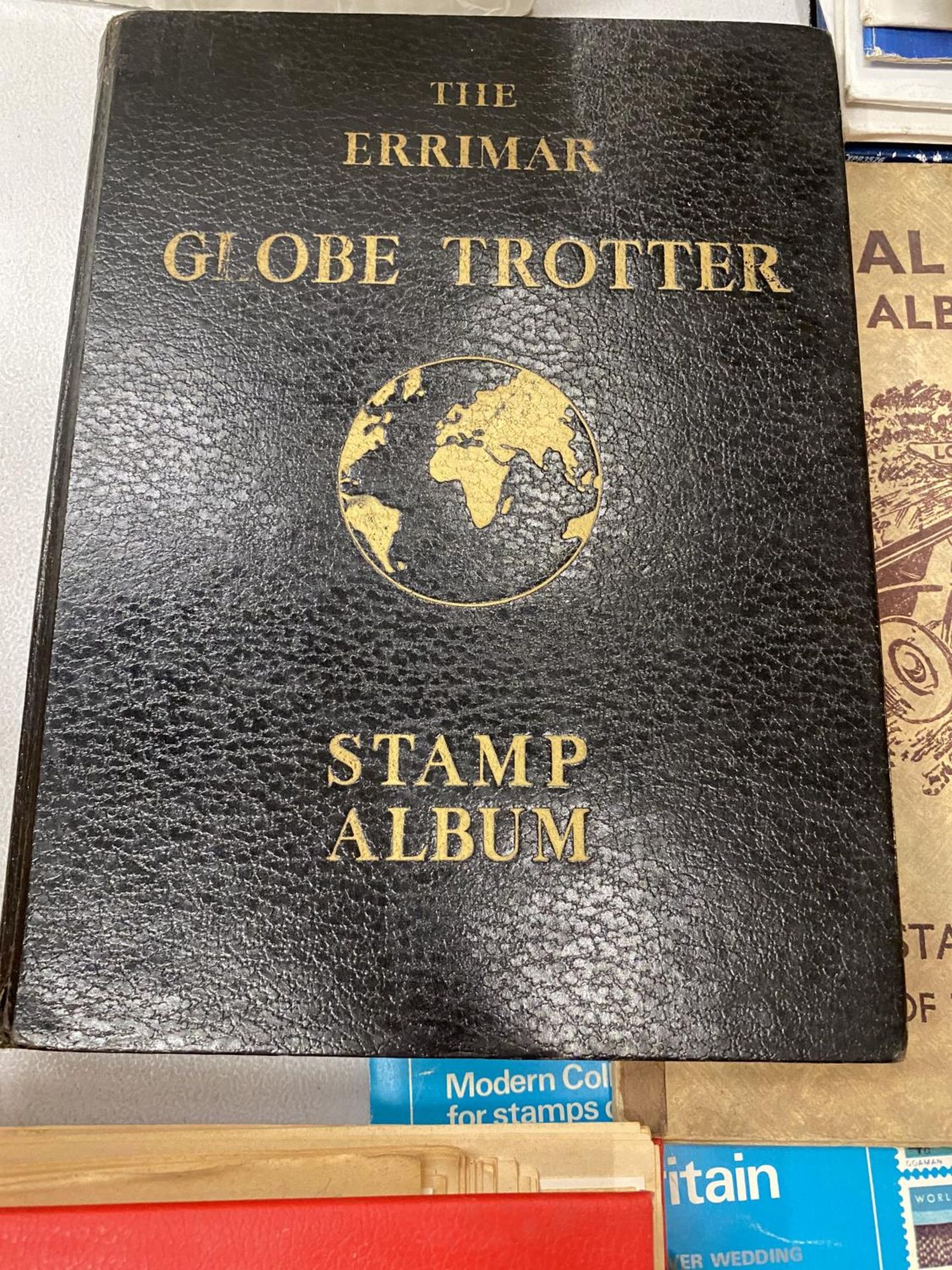 A COLLECTION OF SIX VINTAGE STAMP ALBUMS - Image 3 of 6