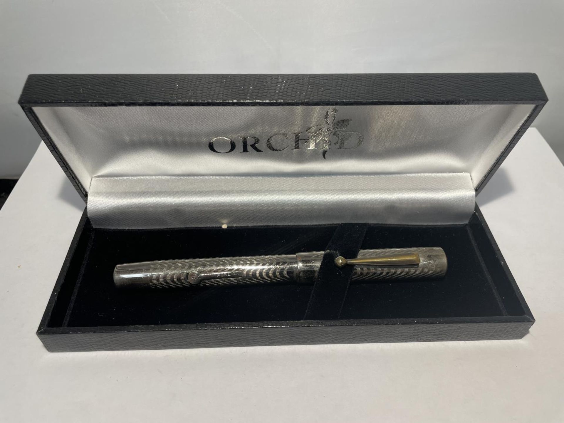 A BOXED FOUNTAIN PEN