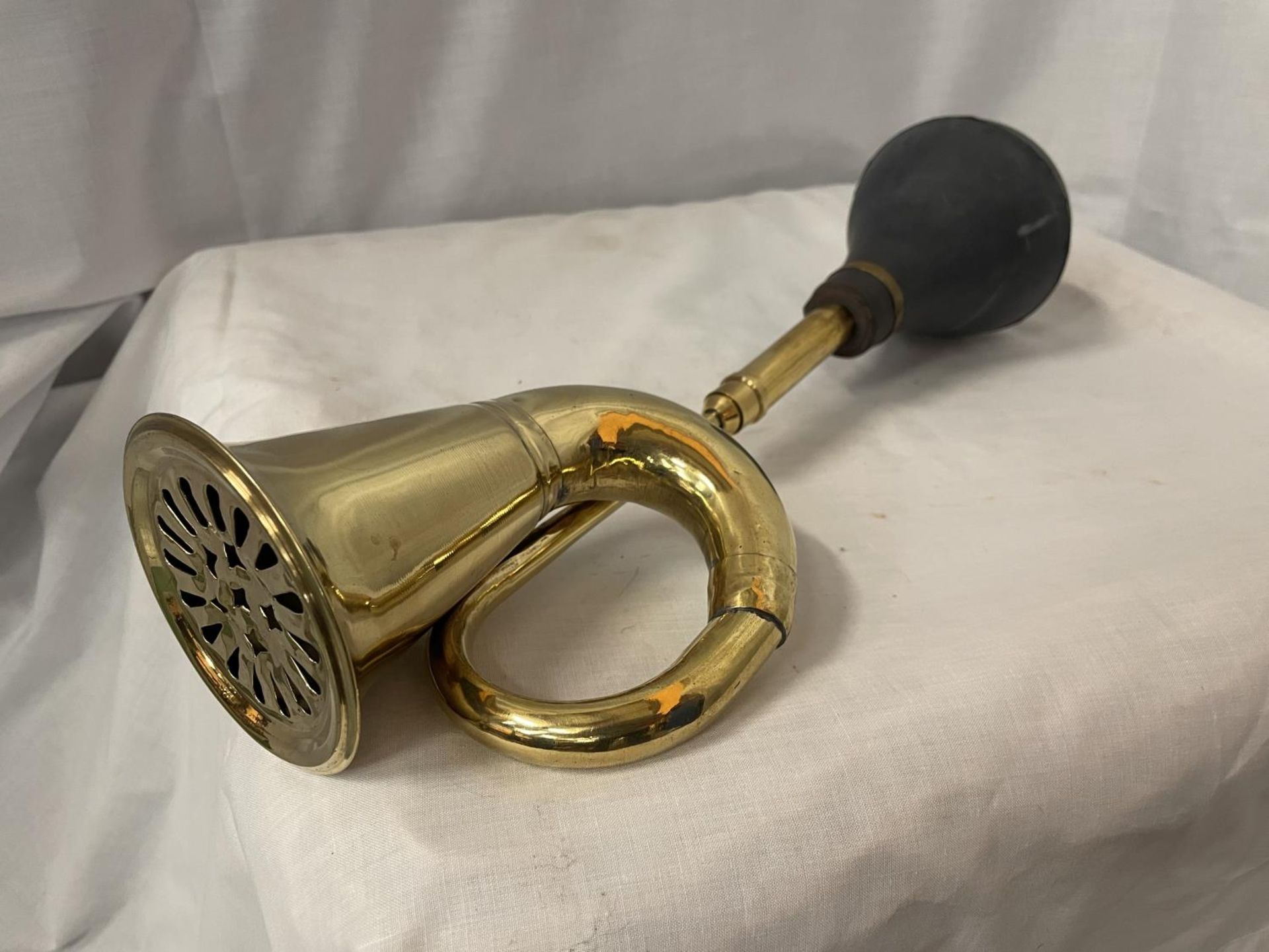 A BRASS CAR HORN