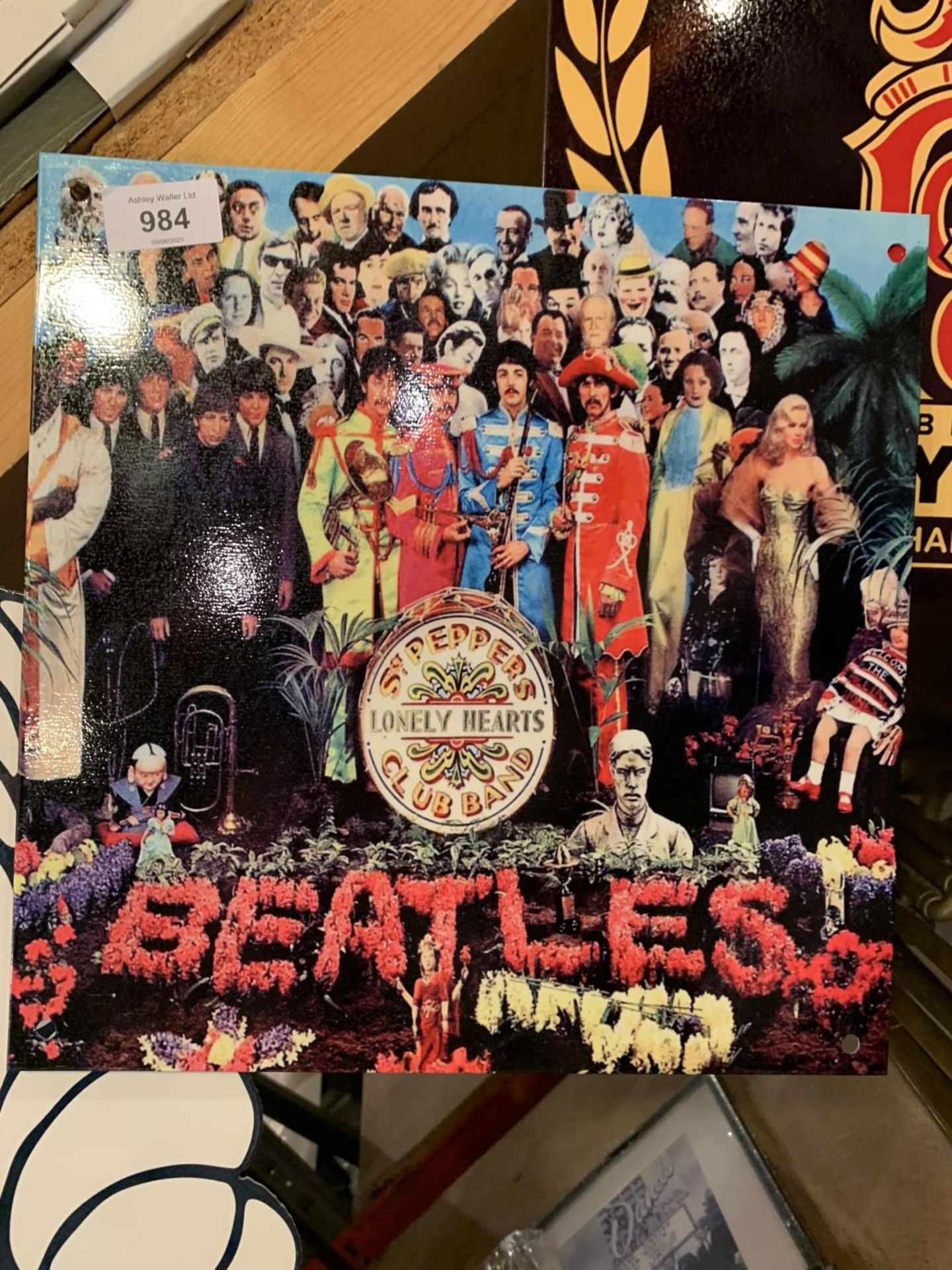 A BEATLES 'SGT PEPPERS LONELY HEARTS CLUB BAND' METAL SIGN