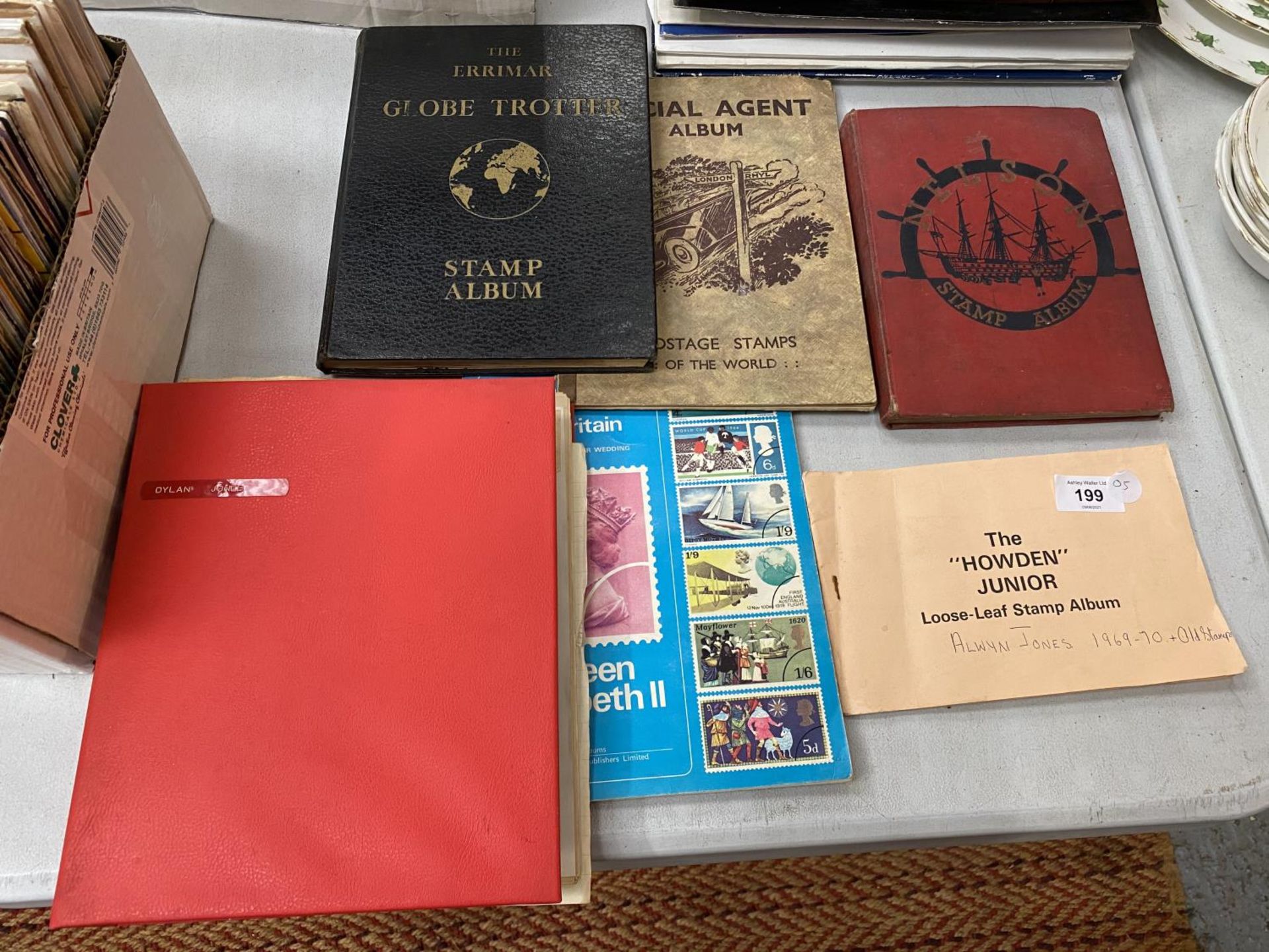 A COLLECTION OF SIX VINTAGE STAMP ALBUMS