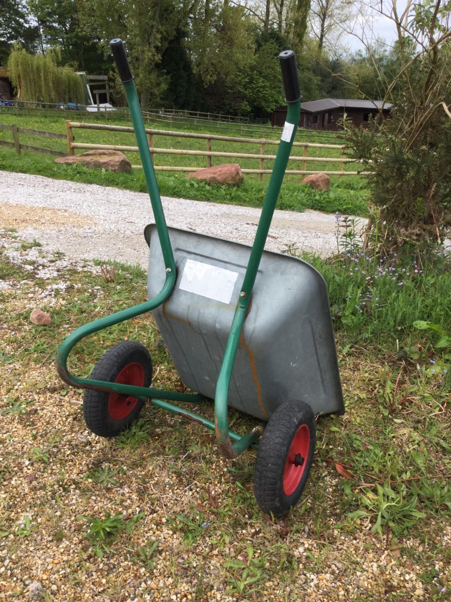 A TWIN WHEELBARROW NB:THESE ITEMS ARE TO BE COLLECTED FROM HEATHER BANK FARM, CONGLETON, CHESHIRE,