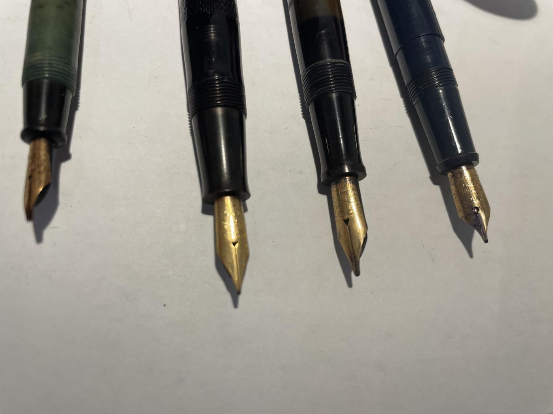 FOUR VINTAGE FOUNTAIN PENS WITH 14 CARAT GOLD NIBS - A COMBRIDGE NO 2, A CONWAY STEWART, A SPOT - Image 3 of 3