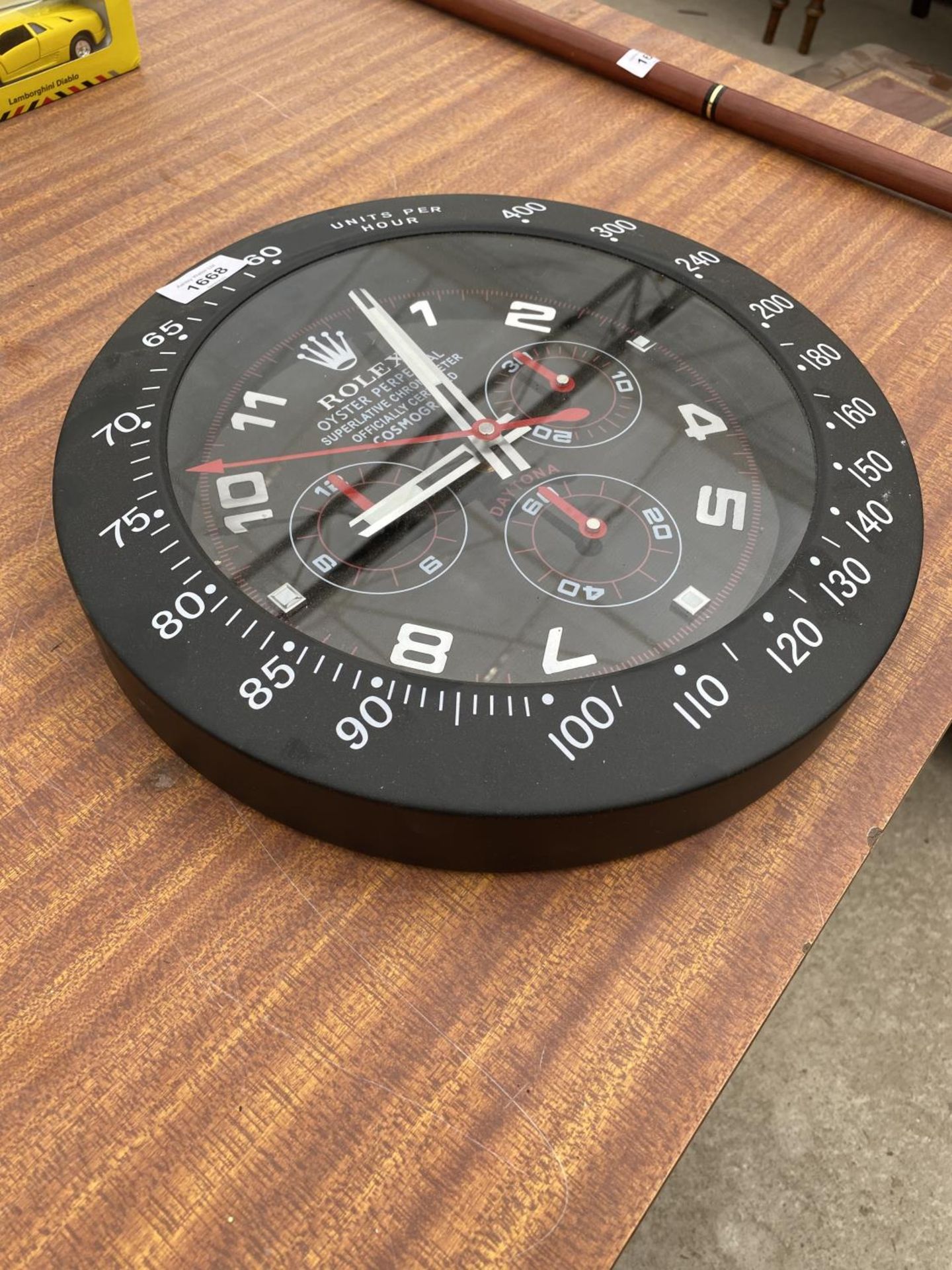 A DEALERS WALL CLOCK - Image 4 of 4