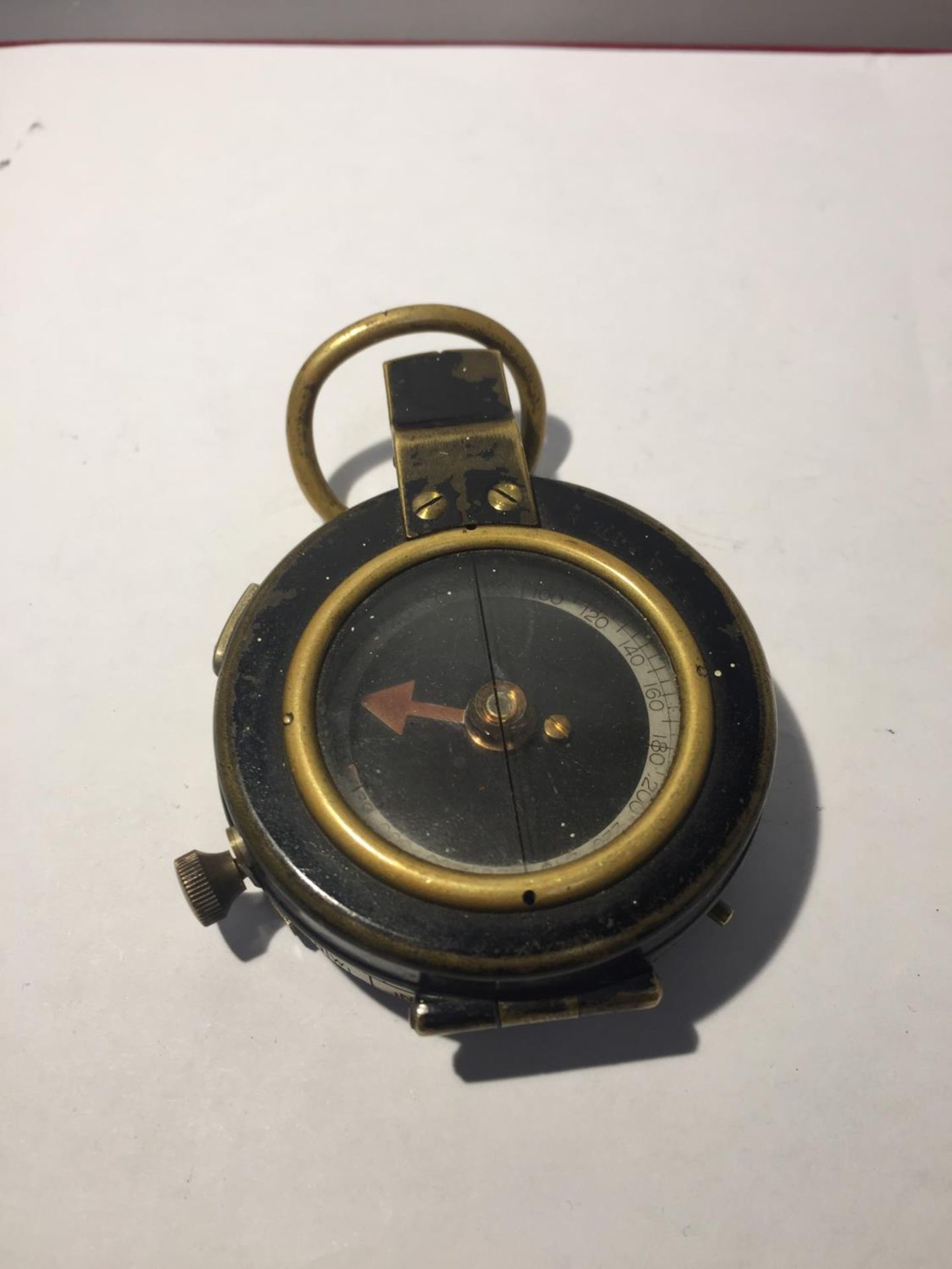 A MILITARY COMPASS DATED 1917