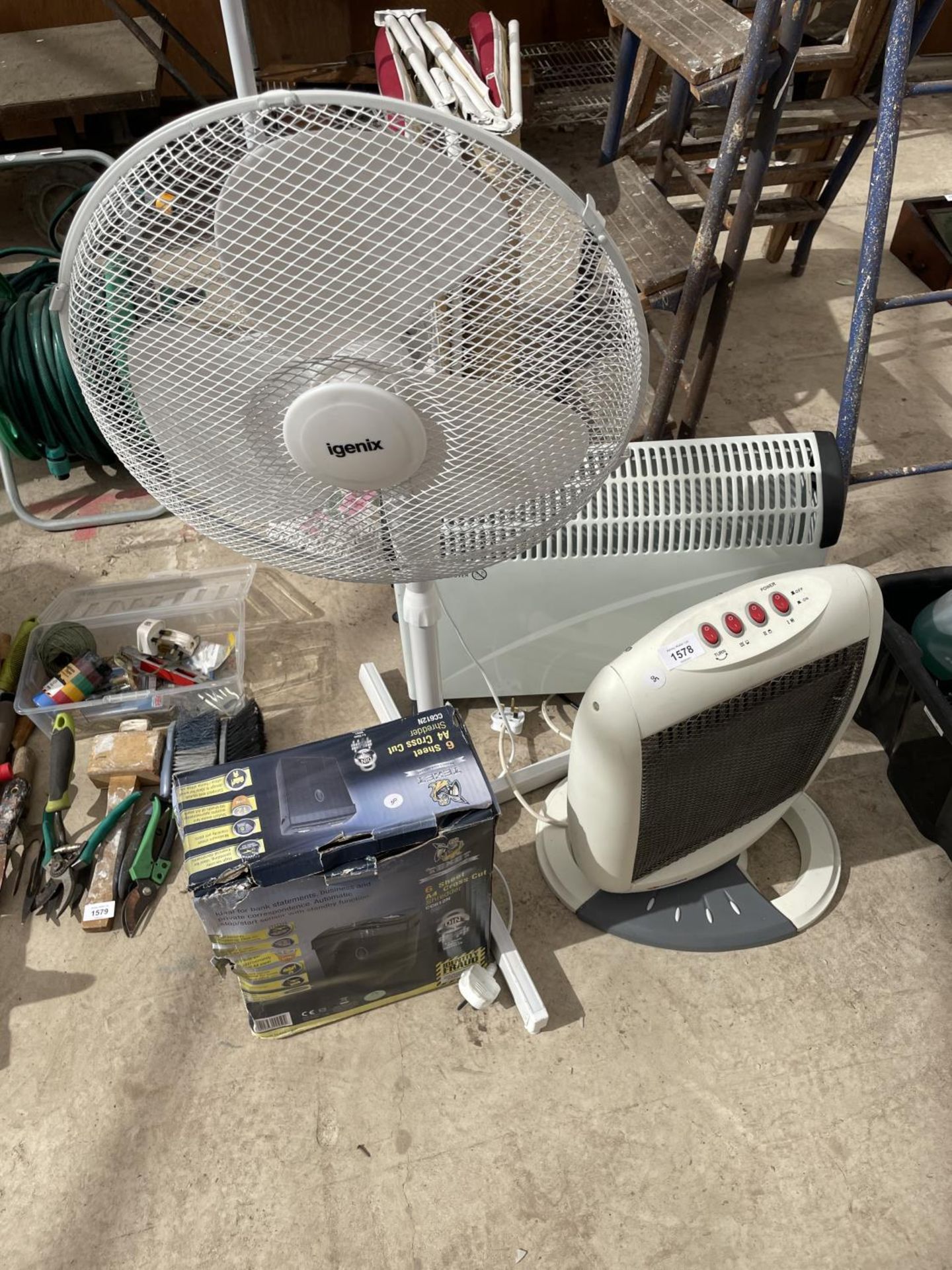 AN ASSORTMENT OF ELECTRIC FANS AND HEATERS
