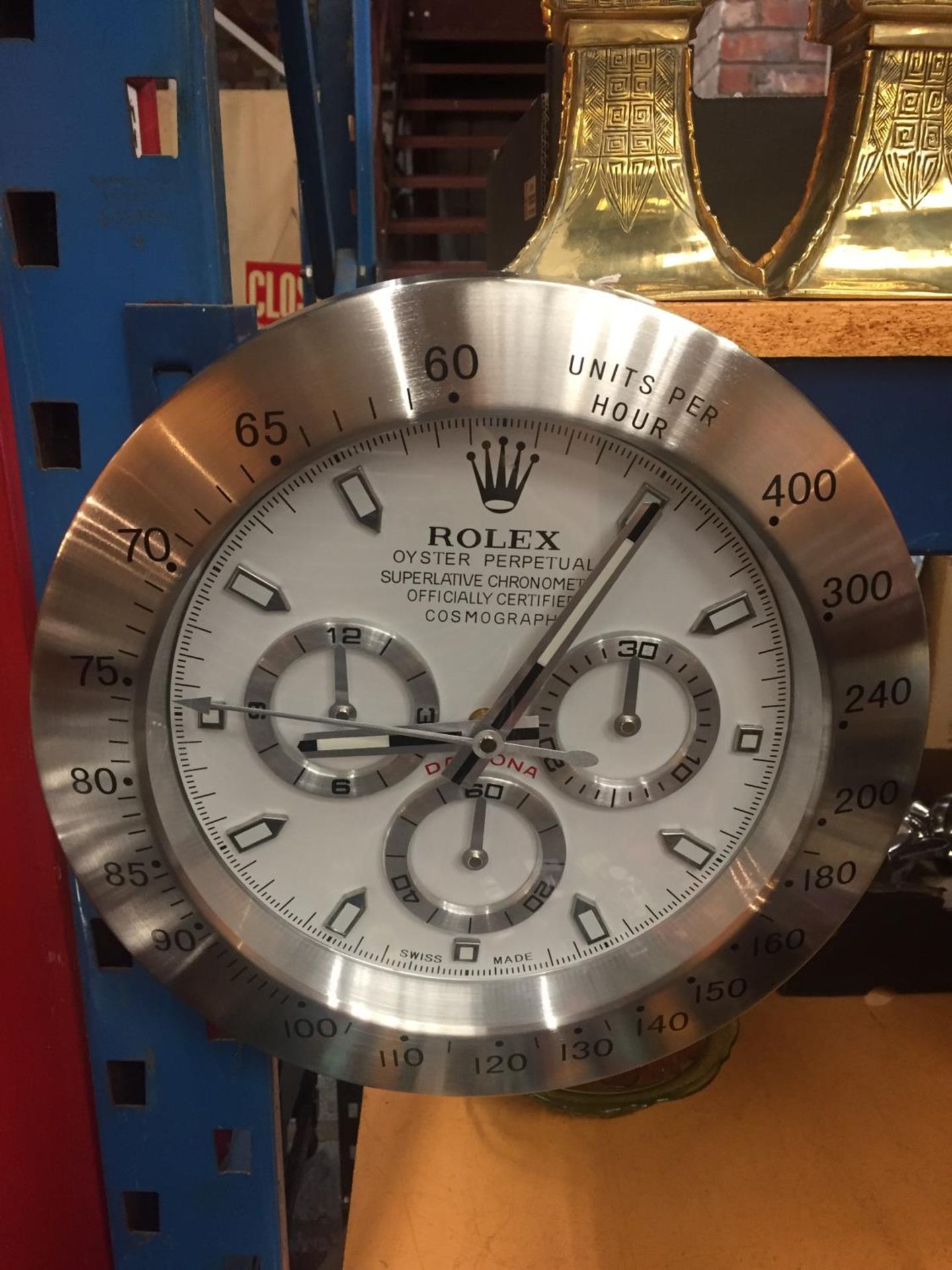 A LARGE DEALERS WALL CLOCK
