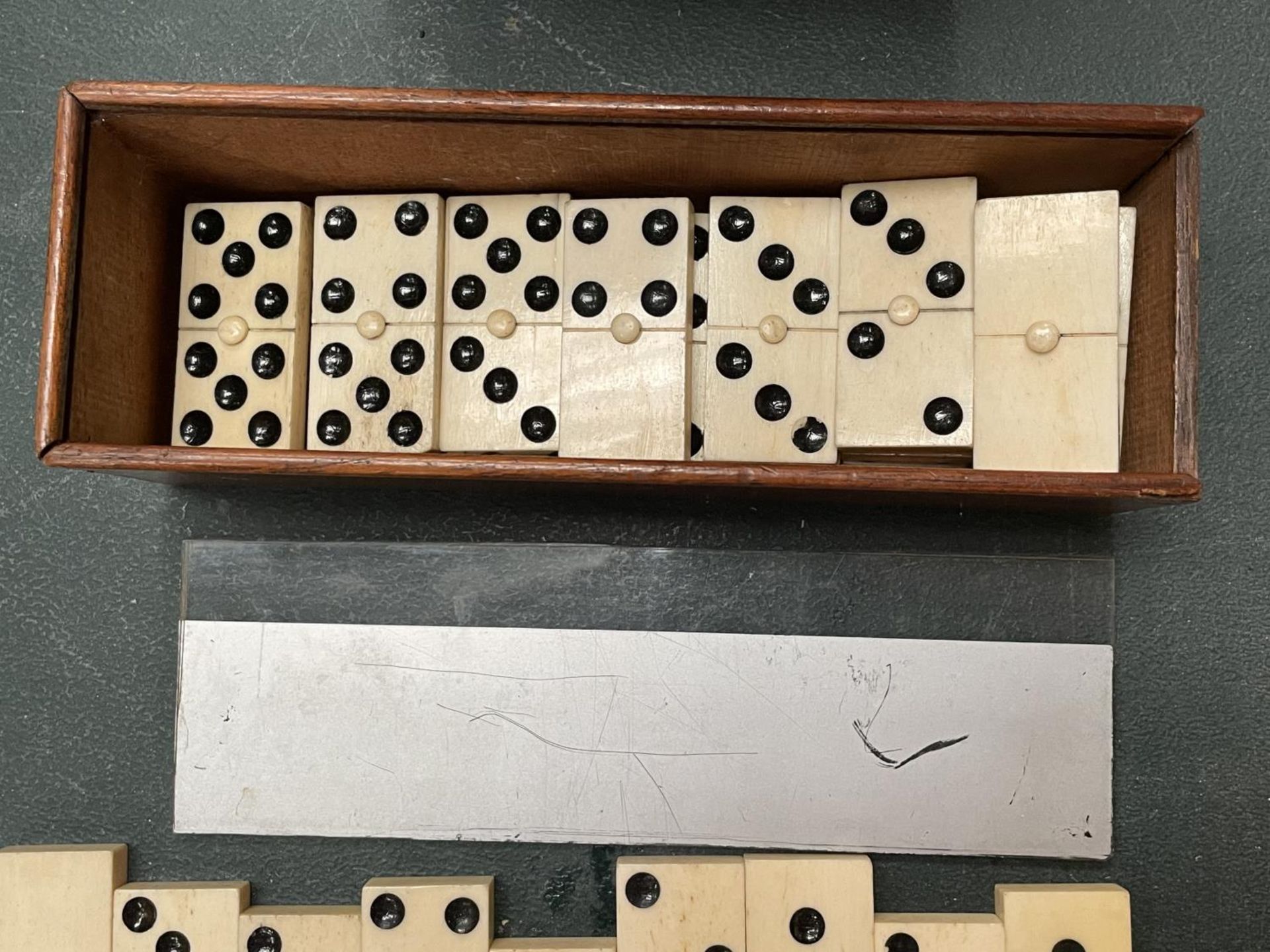 A WOODEN BOXED SET OF BONE DOMINOES - Image 3 of 3