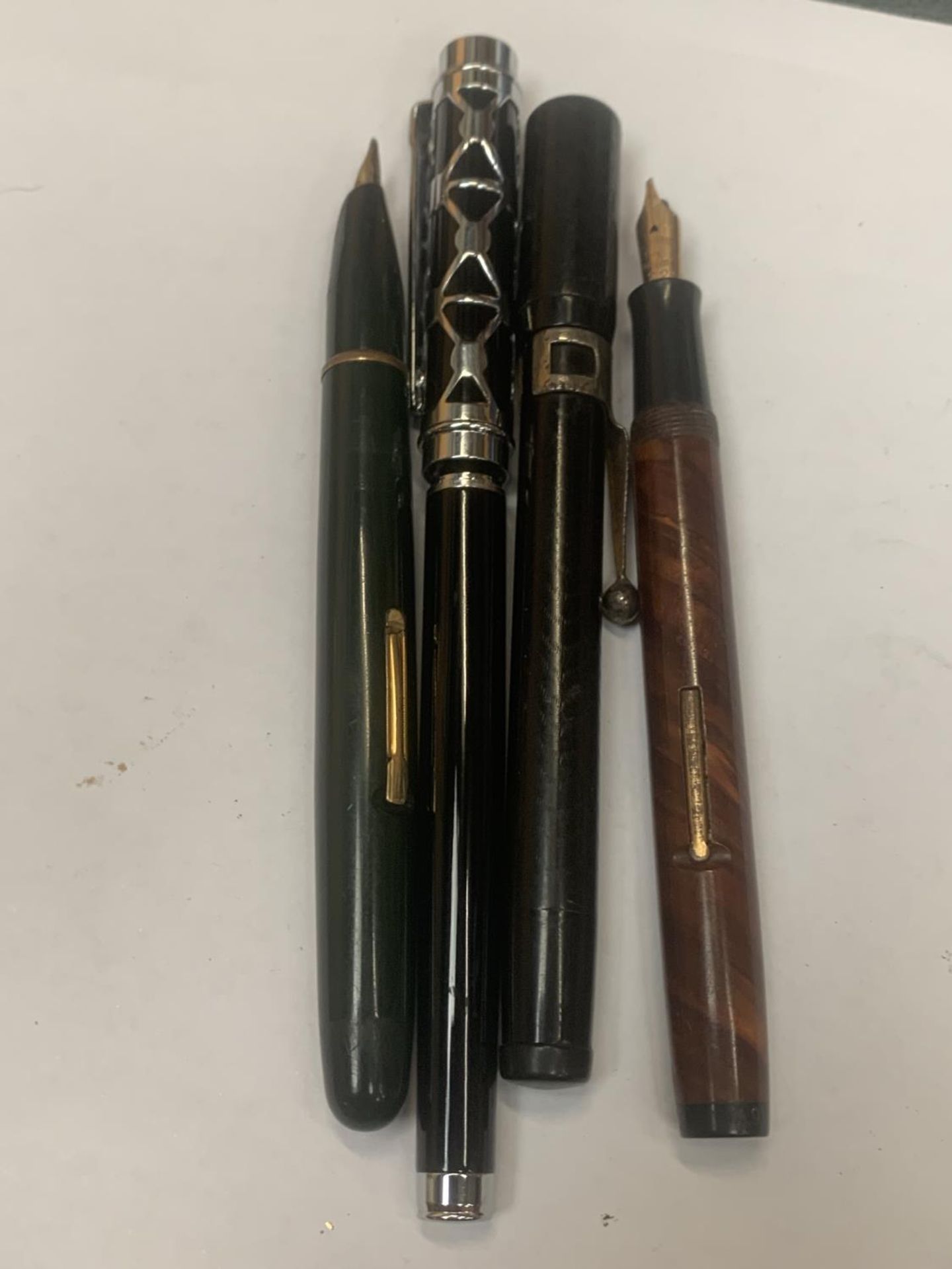 FOUR VARIOUS PENS TO INCLUDE THREE FOUNTAIN PENS AND A BIRO ALL A/F