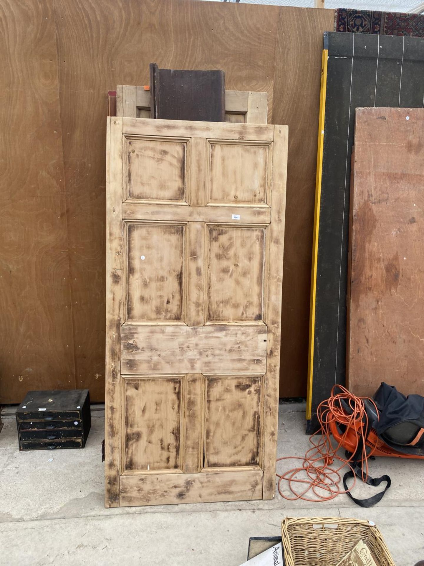 A LARGE COLLECTION OF WOODEN DOORS