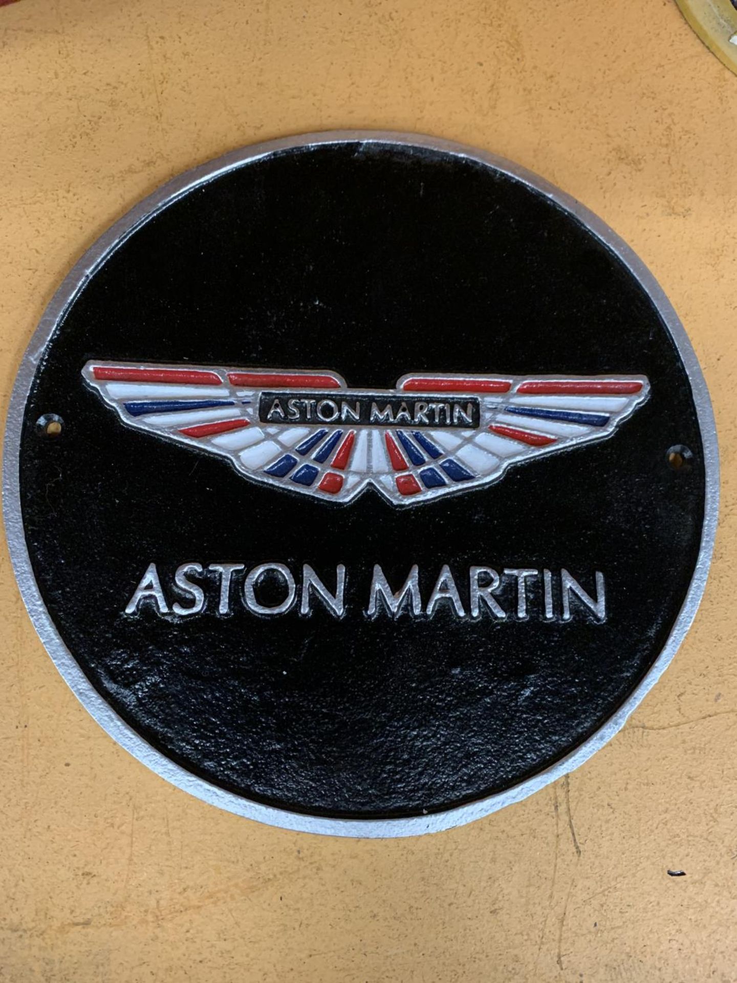 A CAST ASTON MARTIN SIGN