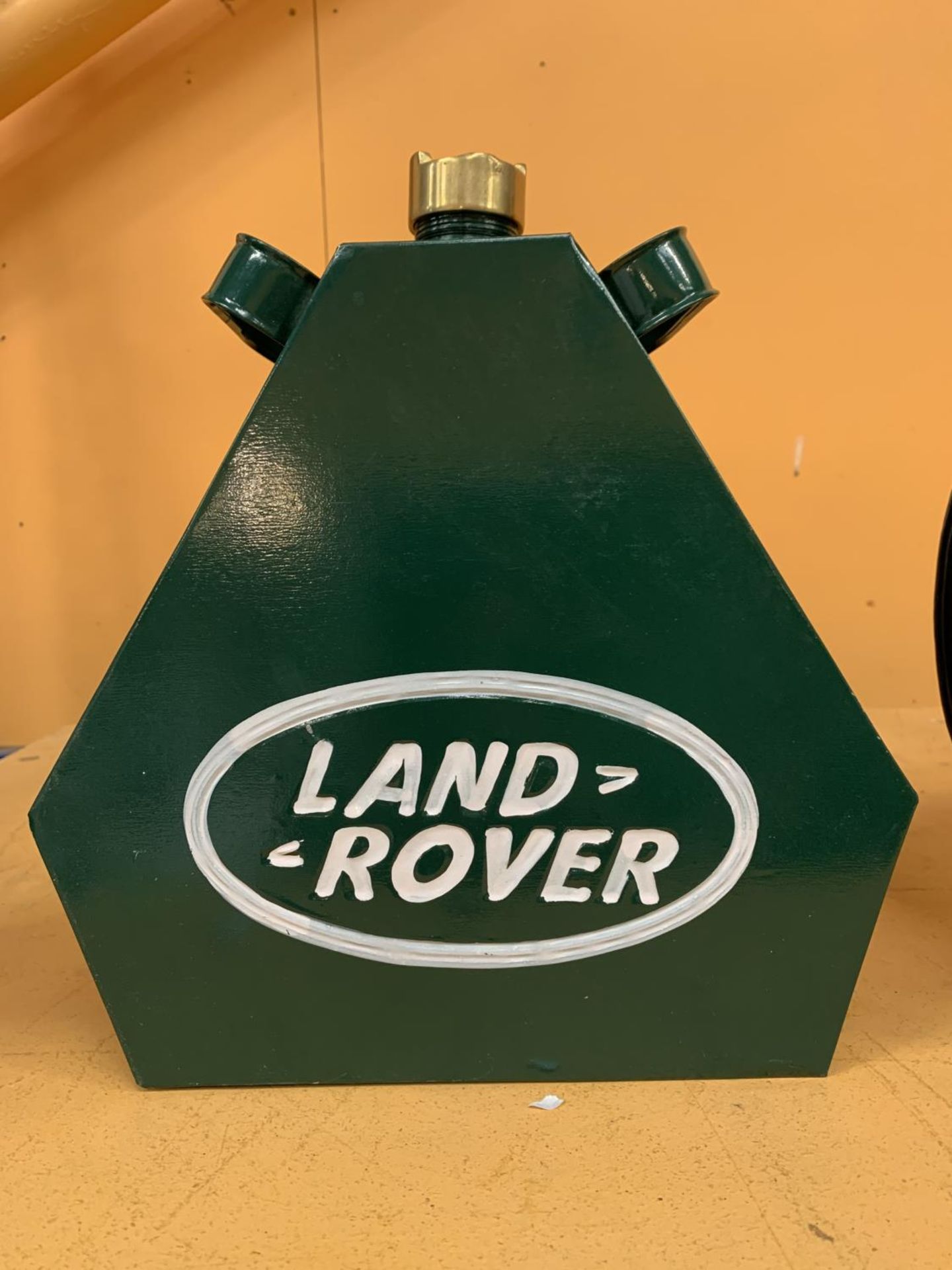 A METAL LANDROVER FUEL CAN WITH BRASS STOPPER
