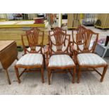 A SET OF SIX REPRODUCTION SPLAT BACK DINING CHAIRS, TWO BEING CARVERS