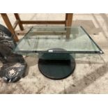 A GLASS OCCASIONAL TABLE
