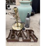 AN ASSORTMENT OF ITEMS TO INCLUDE A LIGHT UP BAR SIGN, A SODA SIPHON AND A LARGE VASE ETC